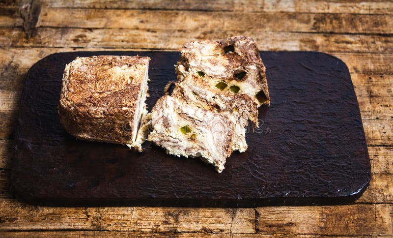 Cacao halva with dried fruit on a cutting board