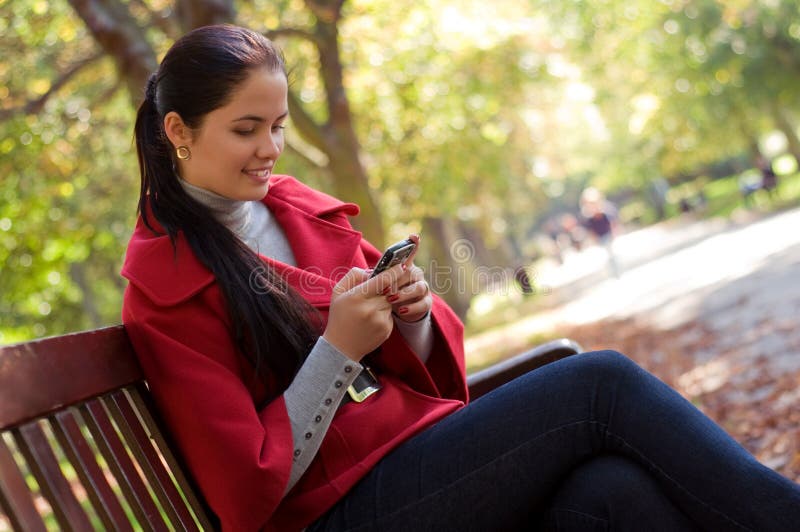 CaCaucasian woman with a cell phone.