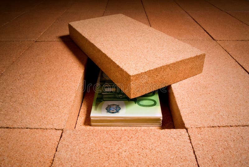Personal savings under a brick in the floor. Personal savings under a brick in the floor