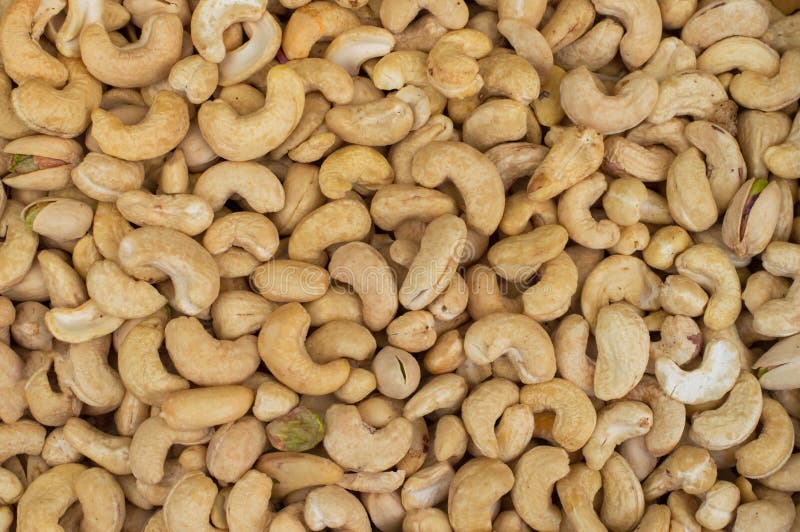 Cachourijken in hart vriendschappelijke vetzuren Gezond voedsel Cashewnoten als voedselachtergrond Hoogste mening Close-up royalty-vrije stock foto Cachourijken in hart vriendschappelijke vetzuren Gezond voedsel Cashewnoten als voedselachtergrond Hoogste mening Close-up royalty-vrije stock foto