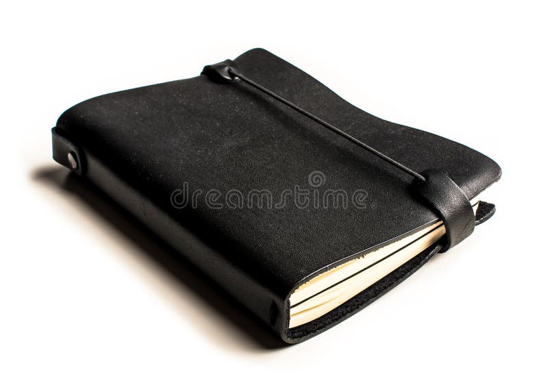 Caderno preto com tampas do couro na perspectiva fotos de stock