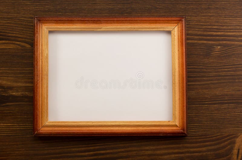 Cadre de tableau de photo sur le bois photographie stock Cadre de tableau de photo sur le bois photographie stock