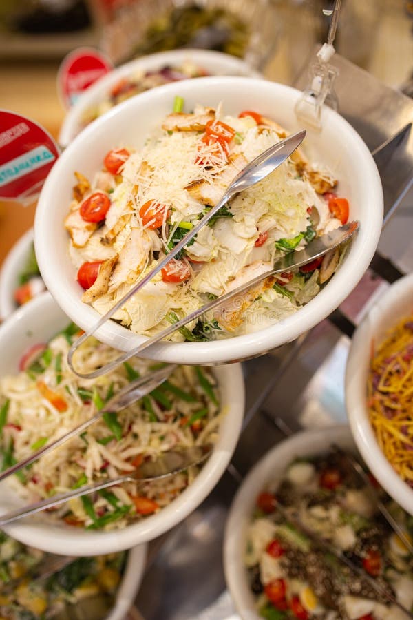 Caesar Salad on the Buffet Table in the Restaurant Editorial Stock