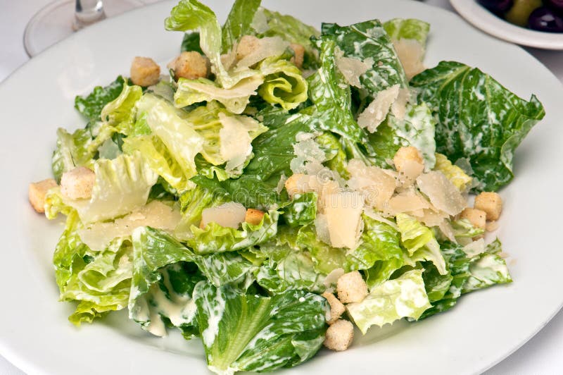 Traditional caesar salad with parmigiana crostoni. Traditional caesar salad with parmigiana crostoni.