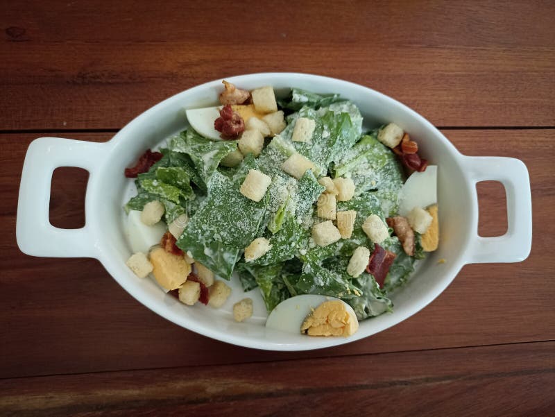 Caesar Vegetable Salad with Parmesan Cheese Lettuce Egg Bread Stock