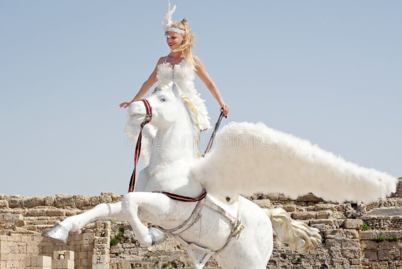 CAESAREA - MARCH 4: Purim celebrations parade, girl on a horse in Ceasearea, Israel on March 4, 2015