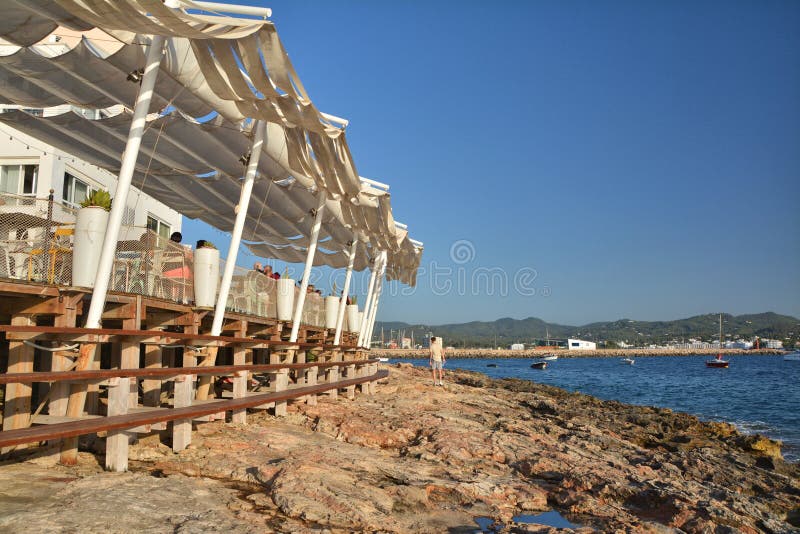 IBIZA, SPAIN - JULY 12, 2017: Cafe del Mar in San Antonio de Portmany on Ibiza island. It is a famous seaside bar with the best views of sunset with chillout music