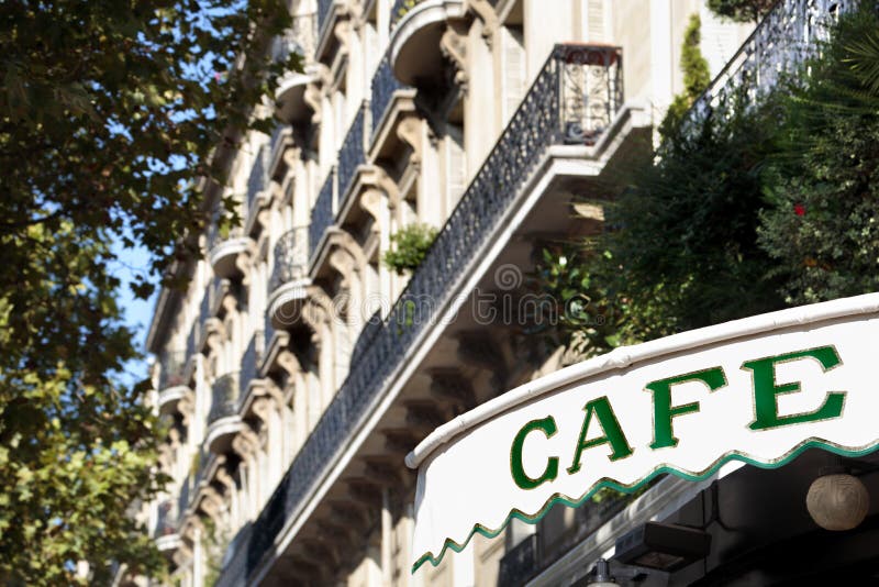 Cafe sign sidewalk Paris France