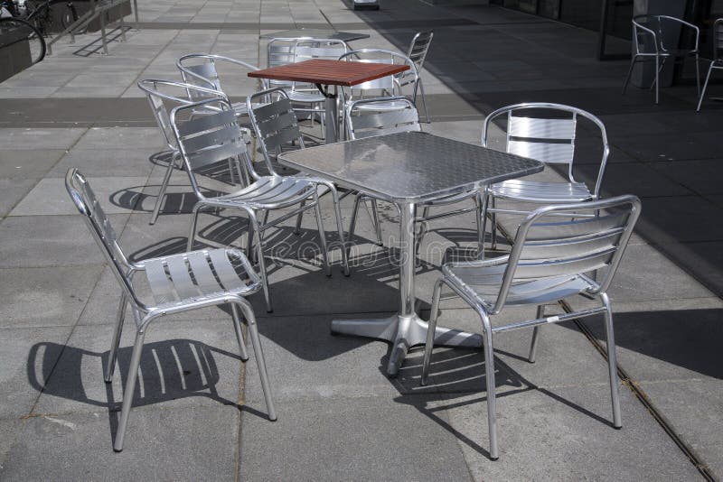 Cafe Table and Chairs stock photo. Image of metal, angle 57532796