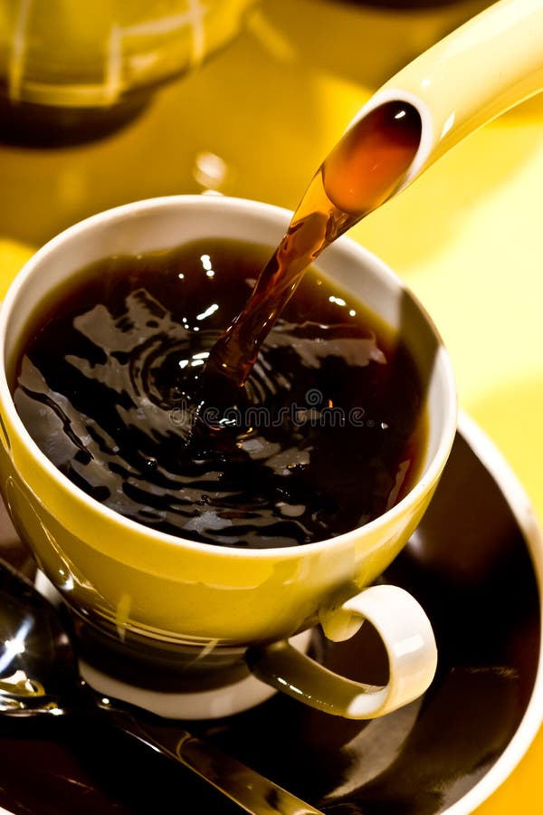 Drink series: black coffee pouring into cup. Drink series: black coffee pouring into cup