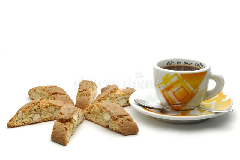 Cup of coffee and almond biscuits isolated over white background. Cup of coffee and almond biscuits isolated over white background