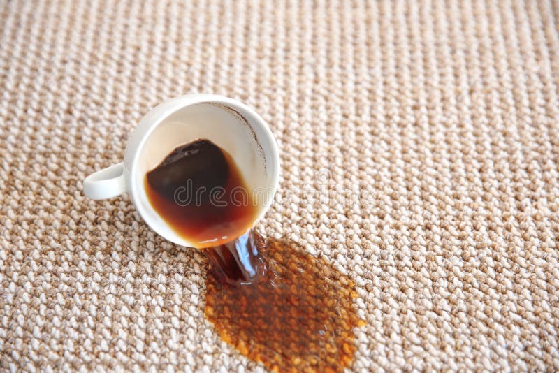 Café derramado no tapete imagens de stock Café derramado no tapete imagens de stock