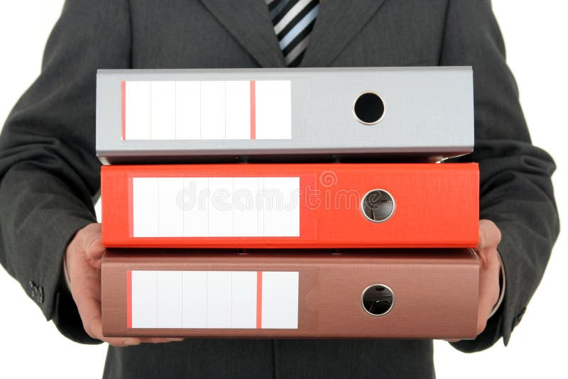 Cahiers de fixation d'homme d'affaires photographie stock