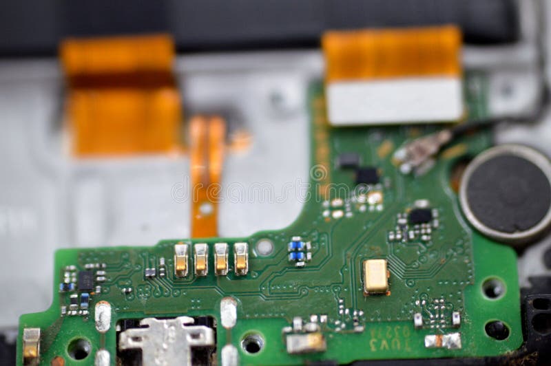 Cairo, Egypt, August 3 2023: Huawei Smartphone cellular mobile device with motherboard electronic chip, camera and SIM card lay royalty free stock images