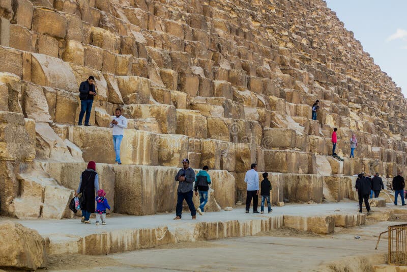 CAIRO, EGYPT - JANUARY 28, 2019: People Climb the Great Pyramid of Giza ...