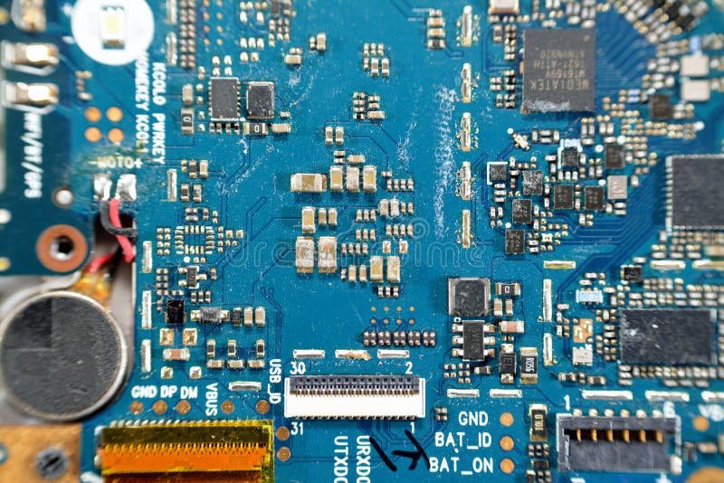 Cairo, Egypt, November 9 2022: Smartphone cellular mobile devices from inside with motherboard electronic chip, camera and SIM royalty free stock images
