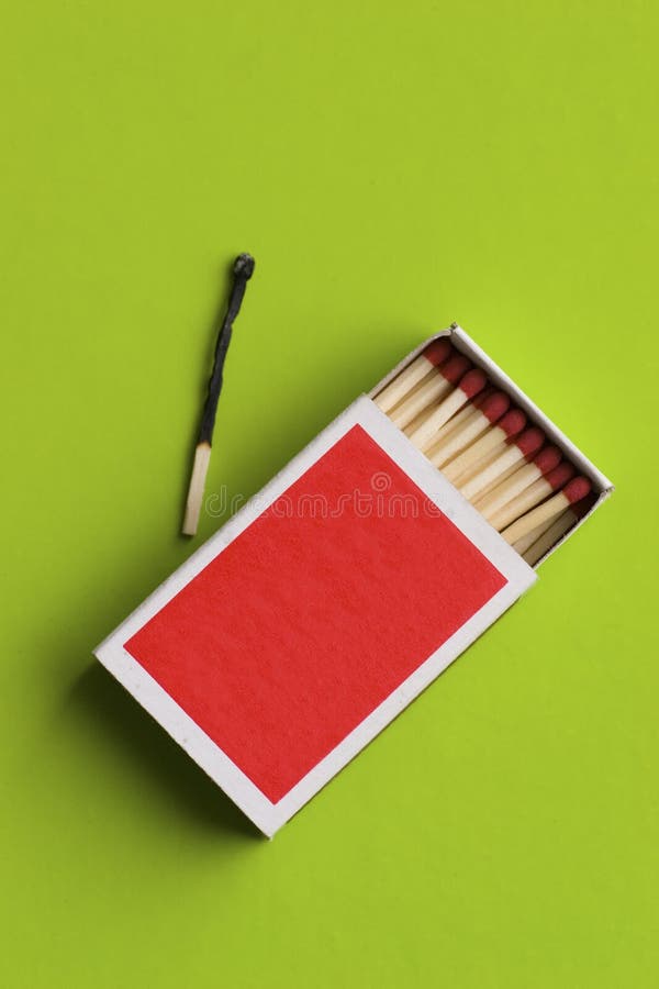 A blank matchbox and burnt match - clipping paths included for easy isolation. A blank matchbox and burnt match - clipping paths included for easy isolation
