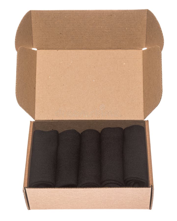 Open foldable corrugated postal box with 5-pack black socks isolated on white background. Open foldable corrugated postal box with 5-pack black socks isolated on white background