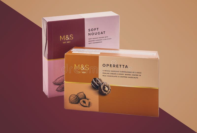 Cajas de dulces de las marcas y de Spencer Soft Nougat y de la opereta imagen de archivo libre de regalías Cajas de dulces de las marcas y de Spencer Soft Nougat y de la opereta imagen de archivo libre de regalías