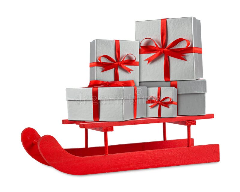 Cajas de regalo de plata rojas de la Navidad en el trineo de madera rojo de Papá Noel fotos de archivo libres de regalías Cajas de regalo de plata rojas de la Navidad en el trineo de madera rojo de Papá Noel fotos de archivo libres de regalías