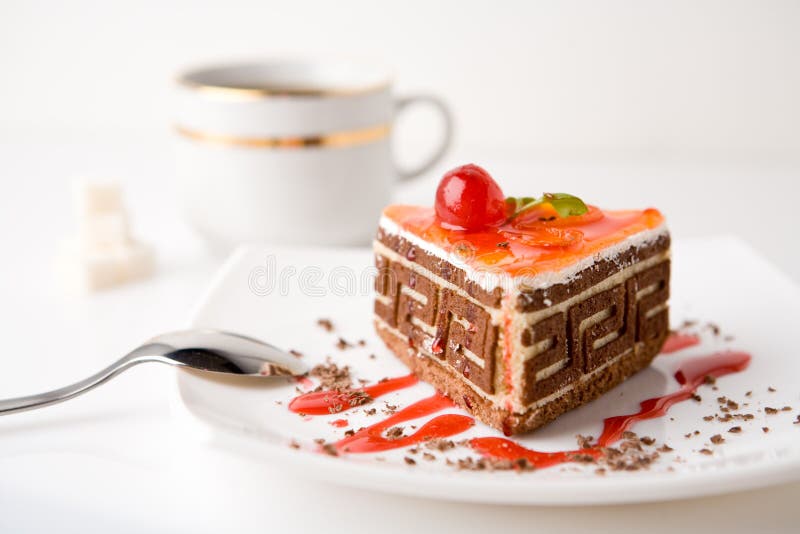 Cake on a white plate on white background. Ceram stock images, royalty-free photos and pictures