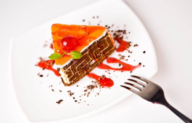 Cake on a white plate on white background. Ceram stock images, royalty-free photos and pictures