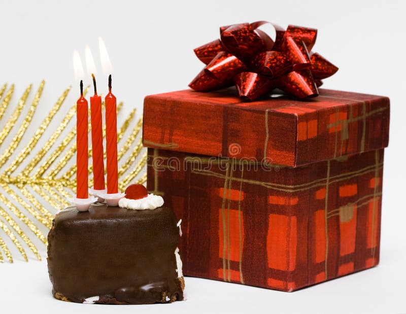 Cake with candles and gift