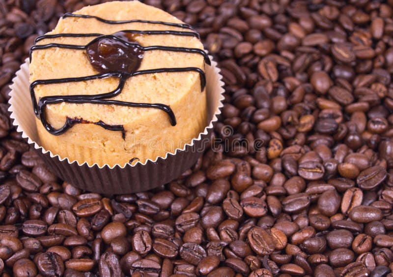 Cake on coffee beans backdrop