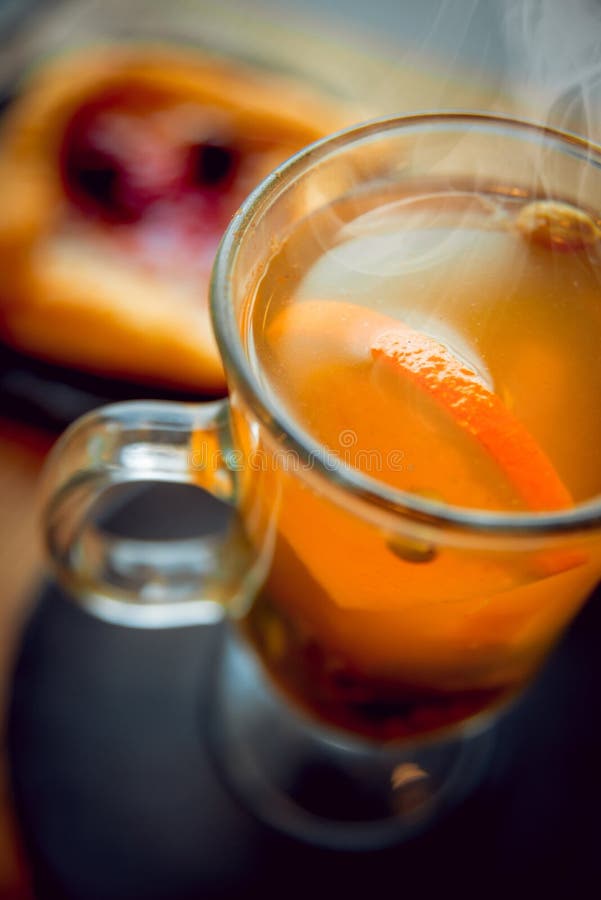 Cake with hot herbal tea stock photo. Image of spice 65993600