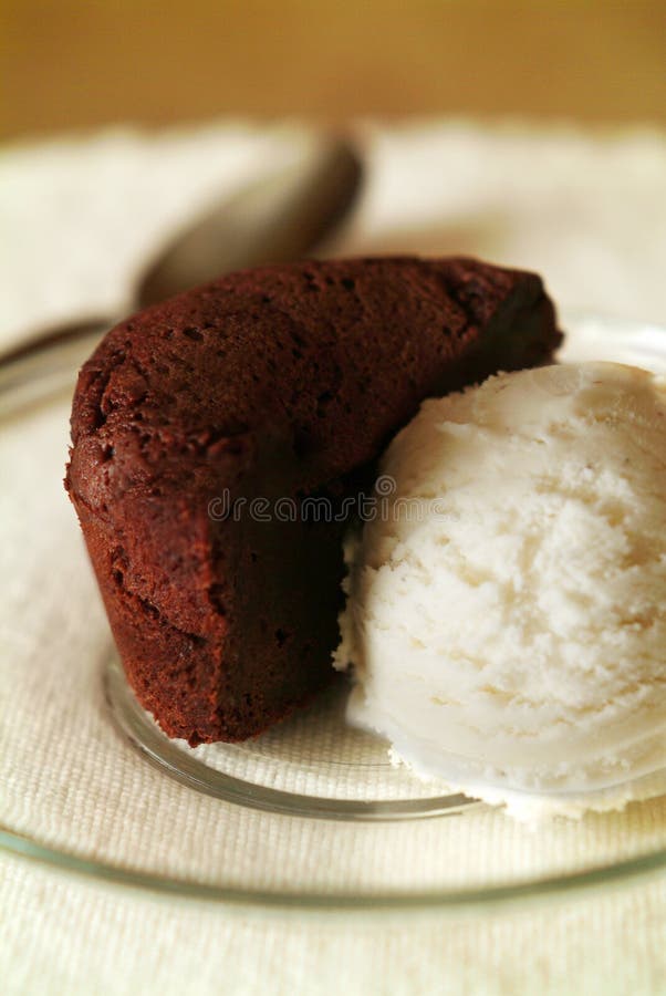 Molten chocolate cake with vanilla ice cream. Molten chocolate cake with vanilla ice cream