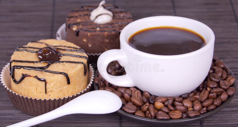 Cakes and cup of coffee