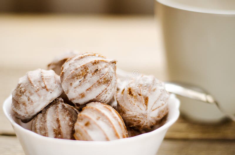 Cakes Sprinkled with Powdered Sugar in Bowl. Dessert for Breakfast