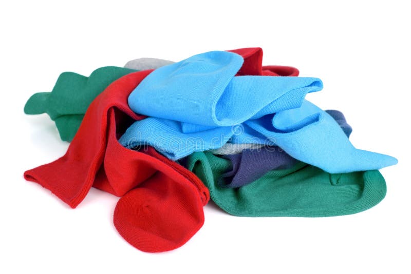 Some pairs of socks of different colors in a pile on a white background. Some pairs of socks of different colors in a pile on a white background
