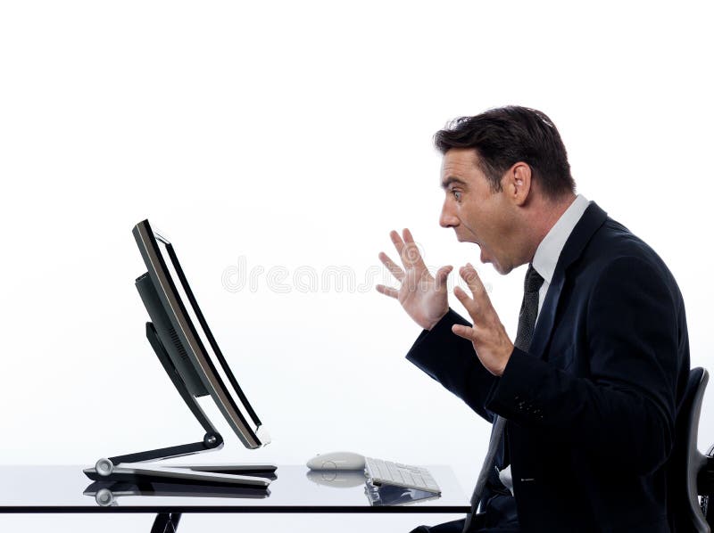 Calcul homme-ordinateur d'affaires étonné photographie stock libre de droits Calcul homme-ordinateur d'affaires étonné photographie stock libre de droits