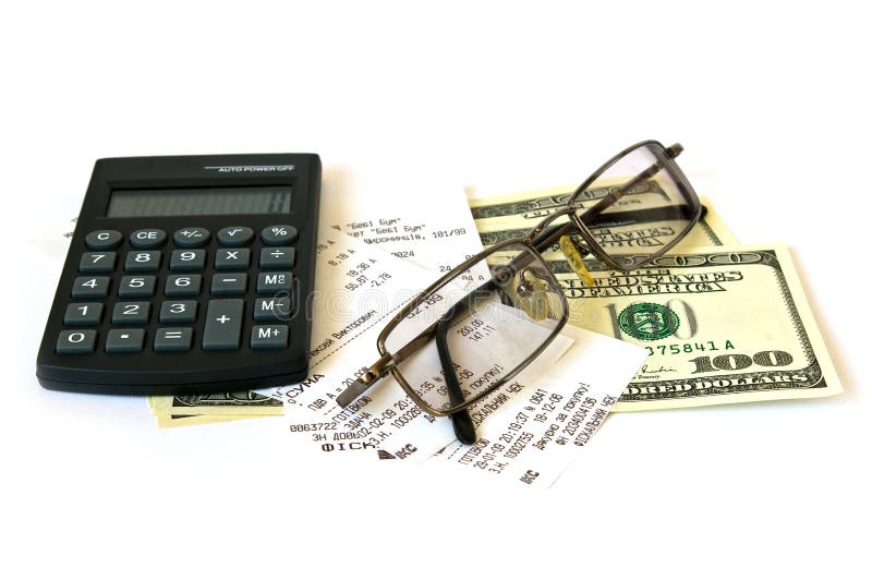 Calculator and dollars on white background