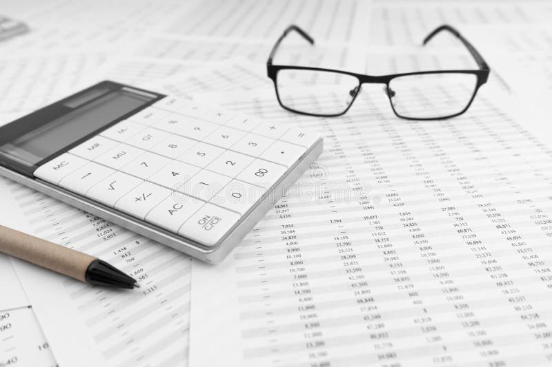Calculator and Eye Glasses on Financial Statement. Top View Stock Image Image of account