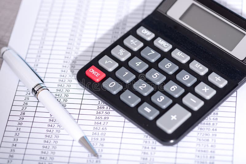 Calculator on financial documents, accounting concept royalty free stock images Calculator on financial documents, accounting concept royalty free stock images