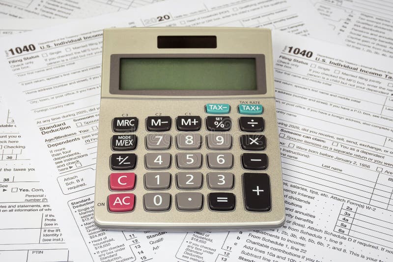 Calculator on 1040 Tax Form Editorial Stock Image Image of