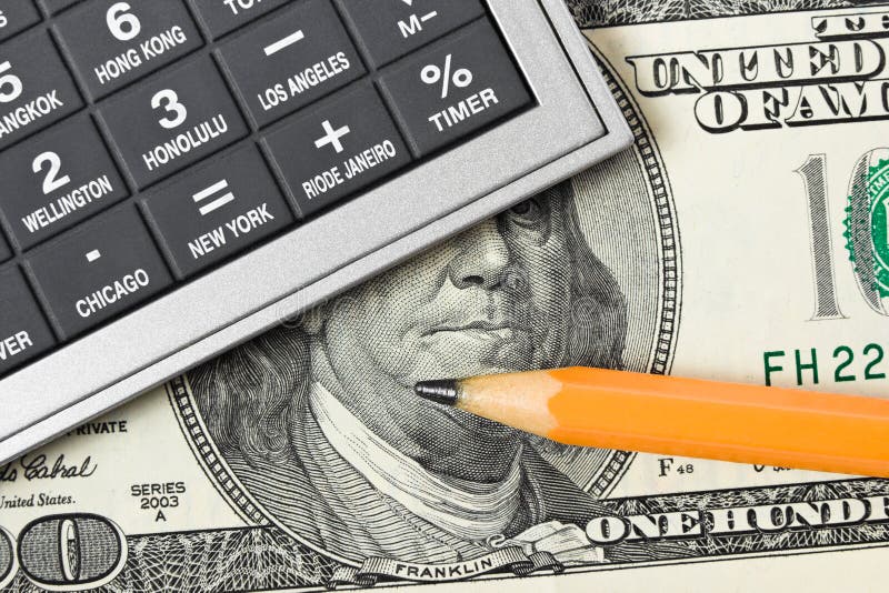 Calculator, money and pencil stock photography Calculator, money and pencil stock photography