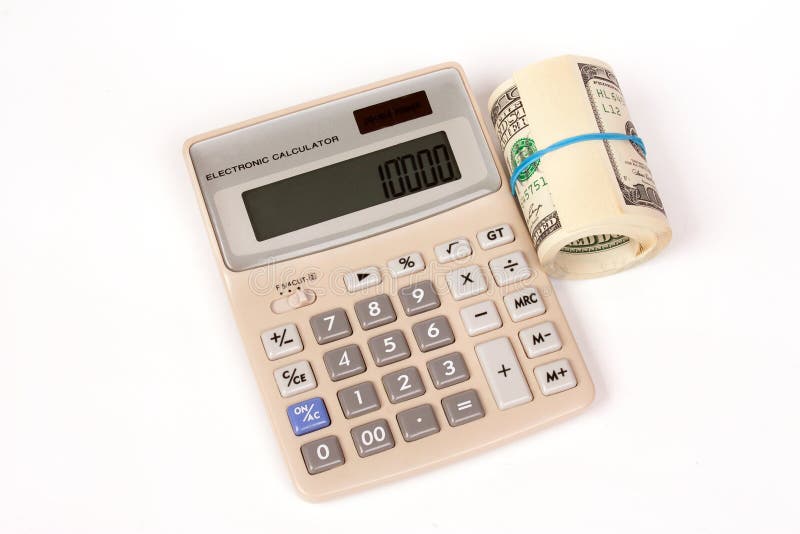 Calculator and one roll from dollars royalty free stock image