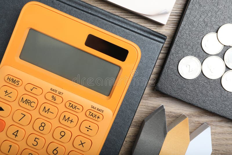 Calculator, stationery and money on table, flat lay. Tax accounting stock image