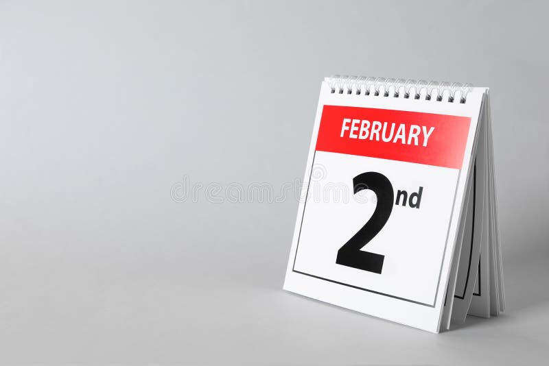 Calendar with date February 2nd on light background, space for text. Groundhog day