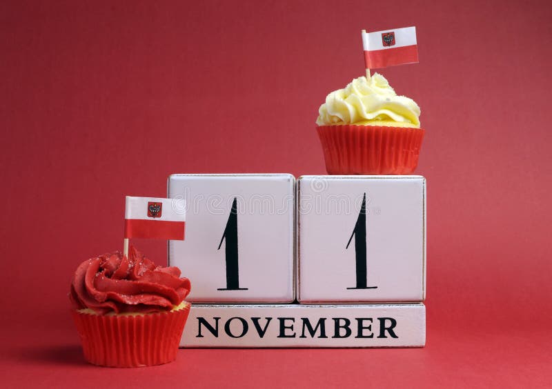 Calendar date for Poland National Independence Day, Novemebr 11, with mini cup cakes and Polish flags in red and white theme colo stock photos Calendar date for Poland National Independence Day, Novemebr 11, with mini cup cakes and Polish flags in red and white theme colo stock photos