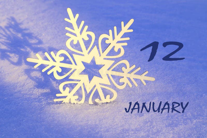 Calendar for January 12 Decorative Snowflake on the Snow Closeup