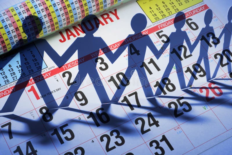 Calendar and Paper Cutout Dolls stock photography
