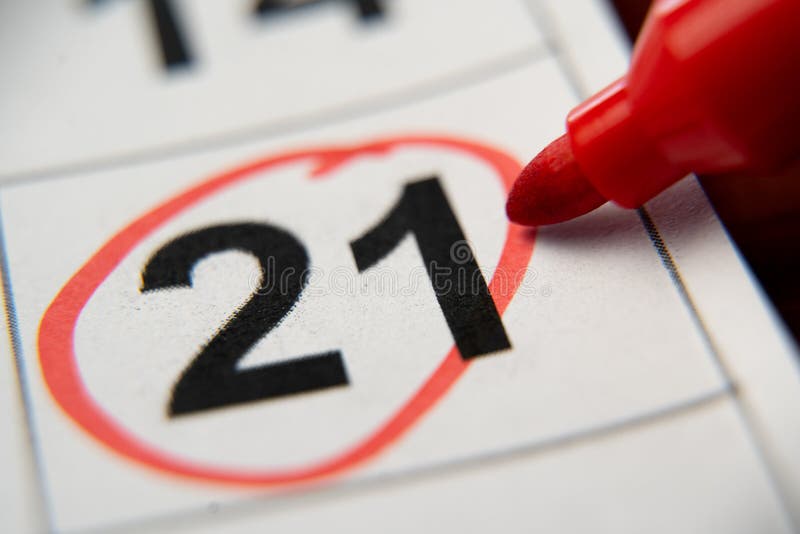The Calendar 21st of the Month is Circled. a Red Marker Circles the