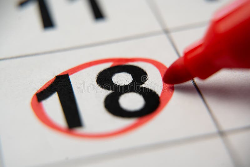 The Calendar 18th Day of the Month is Circled. a Red Marker Circles the