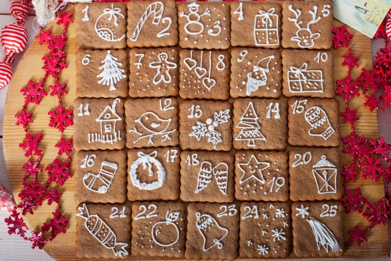 Calendrier d'avènement, biscuits de Noël images libres de droits Calendrier d'avènement, biscuits de Noël images libres de droits