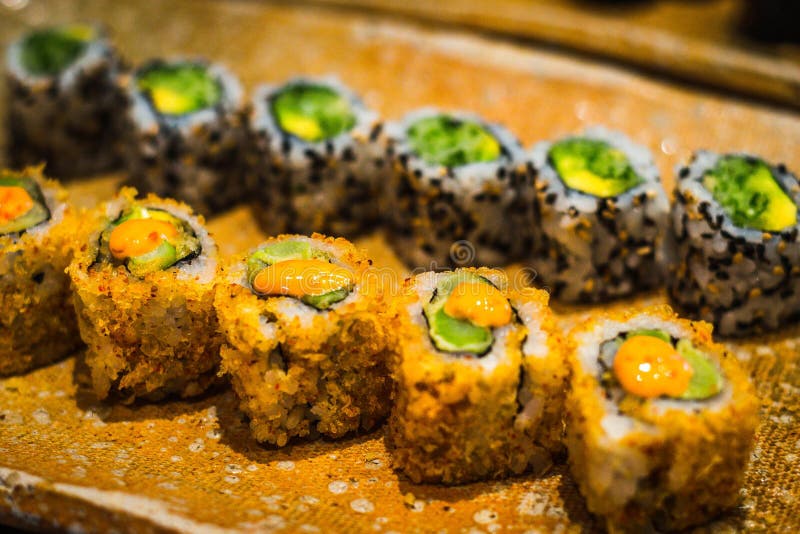 California Maki Roll Sushi Platter with Many Different Kinds of California Sushi Maki Rolls