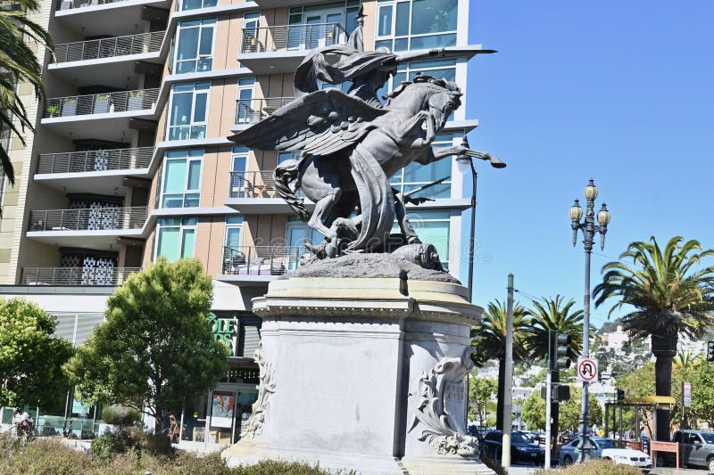 San Francisco California Volunteers Monument is a sculpture dedicated to the solders of the Spanish American War,of April through August 1898. Originally located on Van Ness Avenue at Market Street,the location was criticized as it made the statue,a granite base 10 feet (3 meters) tall holding the 16 foot (4.9 meter) tall by 10 foot (3 meter) long bronze sculpture look insignificant. This location,Dolores and Market Streets,was chosen as it really stands out much better. Although the figure riding the horse is supposed to be the ancient Roman Goddess Bellona,the Goddess of War,some people have thought it is Nike,the Greek Goddess of Victory. As seen 16 August 2023. San Francisco California Volunteers Monument is a sculpture dedicated to the solders of the Spanish American War,of April through August 1898. Originally located on Van Ness Avenue at Market Street,the location was criticized as it made the statue,a granite base 10 feet (3 meters) tall holding the 16 foot (4.9 meter) tall by 10 foot (3 meter) long bronze sculpture look insignificant. This location,Dolores and Market Streets,was chosen as it really stands out much better. Although the figure riding the horse is supposed to be the ancient Roman Goddess Bellona,the Goddess of War,some people have thought it is Nike,the Greek Goddess of Victory. As seen 16 August 2023.